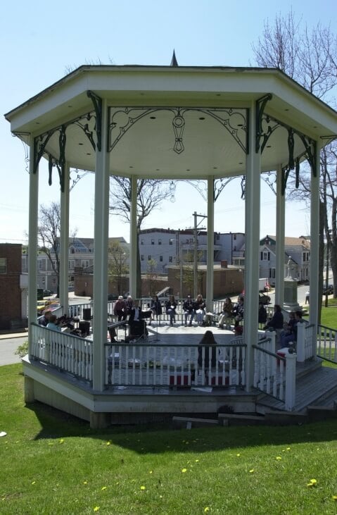 While this gazebo is a public structure, and isn't in a backyard, it is a great example of how large gazebos can be. This one is being used as a private concert venue.