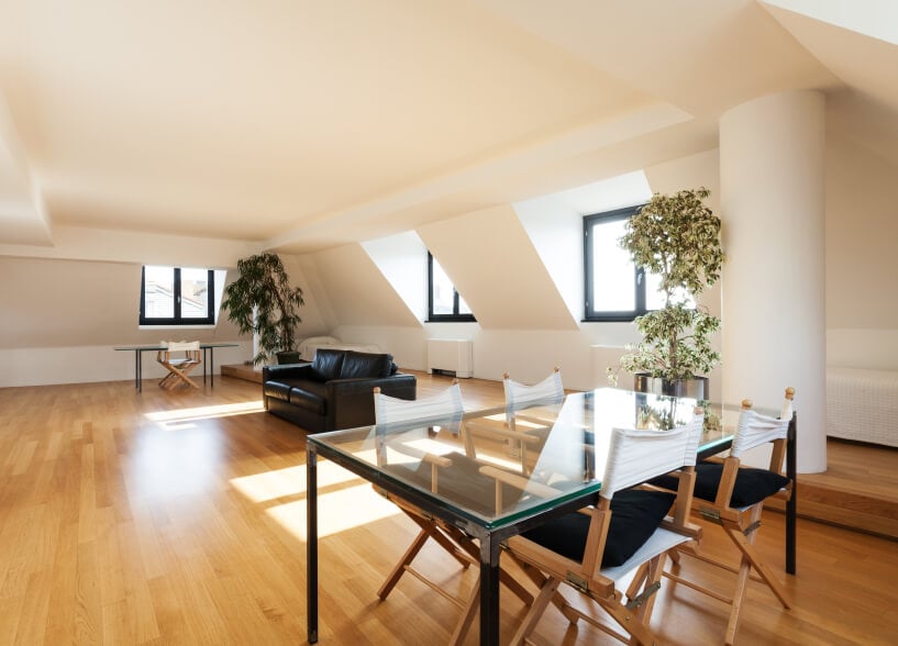 Massive open attic space with hardwood flooring