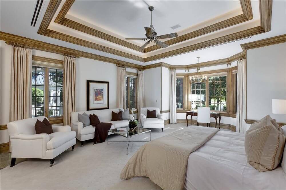 21 Stunning Primary Bedrooms with Couches or Loveseats
