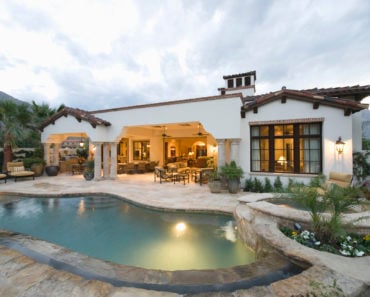 Single story ranch style Mediterranean style home.