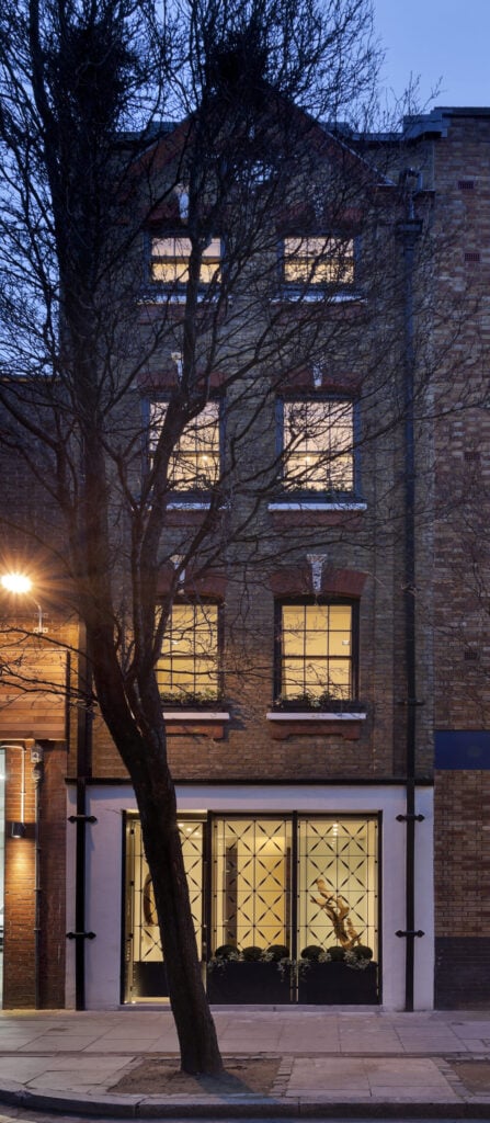Here's a look at the entire home, from ground to roof, its narrow form squeezed into a layered, vertical space.