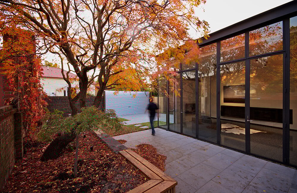 A glamorous garden area featuring a stamped concrete walkway.