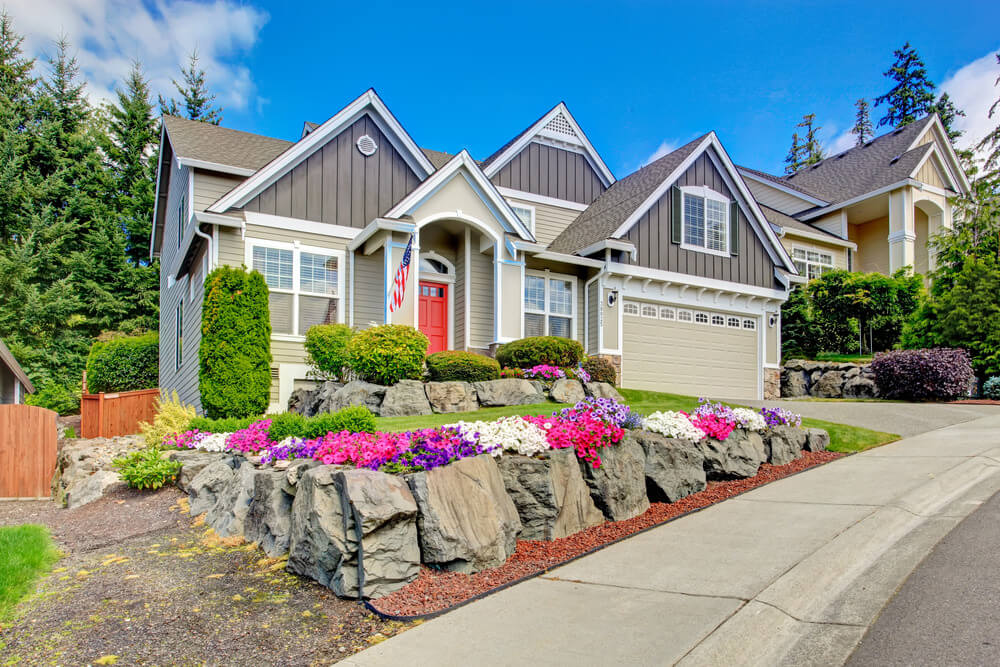 This may look plain and grey yet when decorated with huge rubble stones and colorful petunias, it looks very pleasing to the eyes.