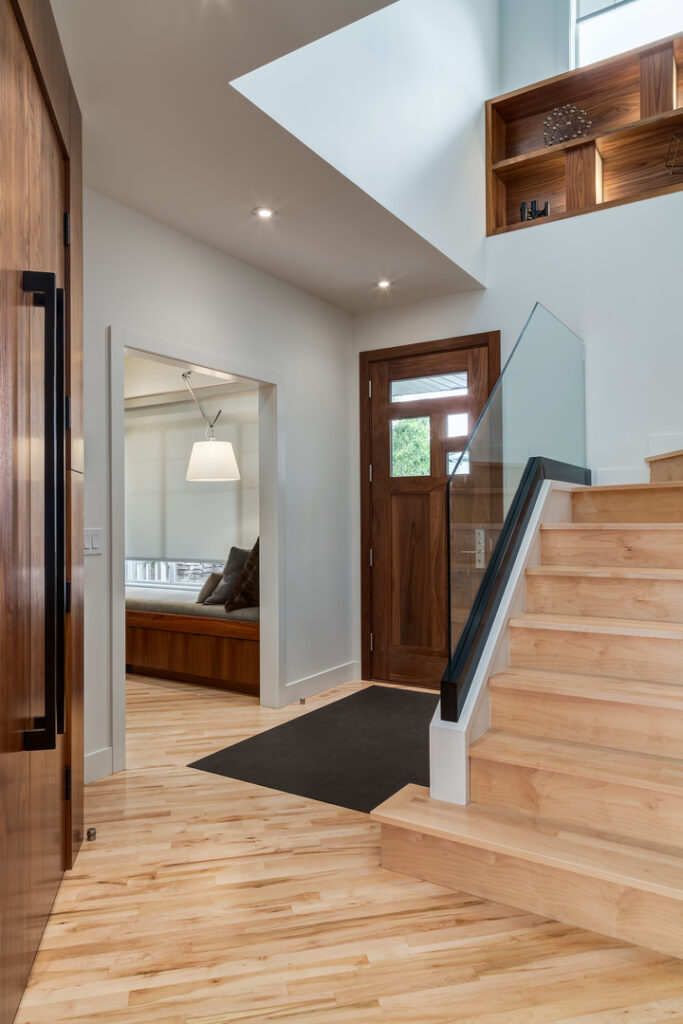 Contemporary Interior Design with Extensive Walnut Millwork by Deana ...