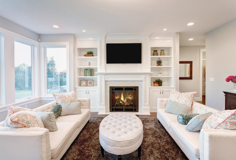 The cozy sofa set is just a perfect fit together with the fireplace and the rug.