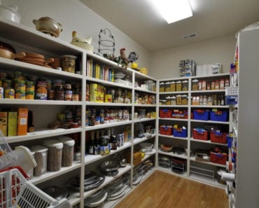 traditional walk-in pantry with hardwood floors and flush light in penn valley, ca