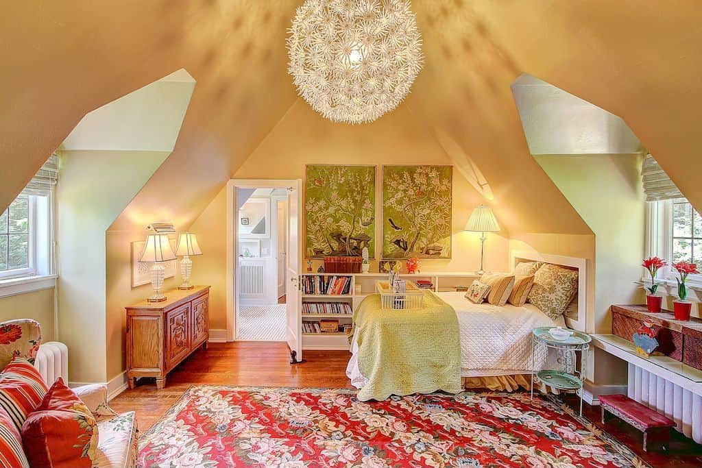 The ceiling and the lighting of this girl's bedroom look so stunning and magnificent. The wall decors are very lovely, along with the rug set on the hardwood flooring.