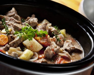 Small slow cooker cooking food.