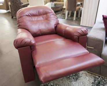 Large red leather recliner chair