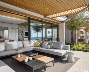 The patio maximises the luxurious outdoor living experience. Photo by Adam Letch / Architecture by Rys Architects / Interior design by ARRCC and Rys Architects / Lighting design by Lux Populi / Landscaping by Cracknell