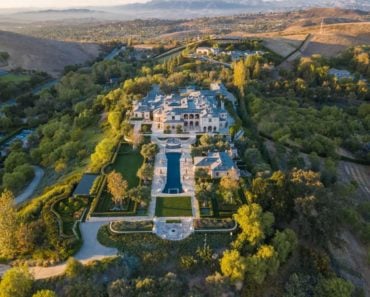 Aerial view of spectacular luxury home on hill top
