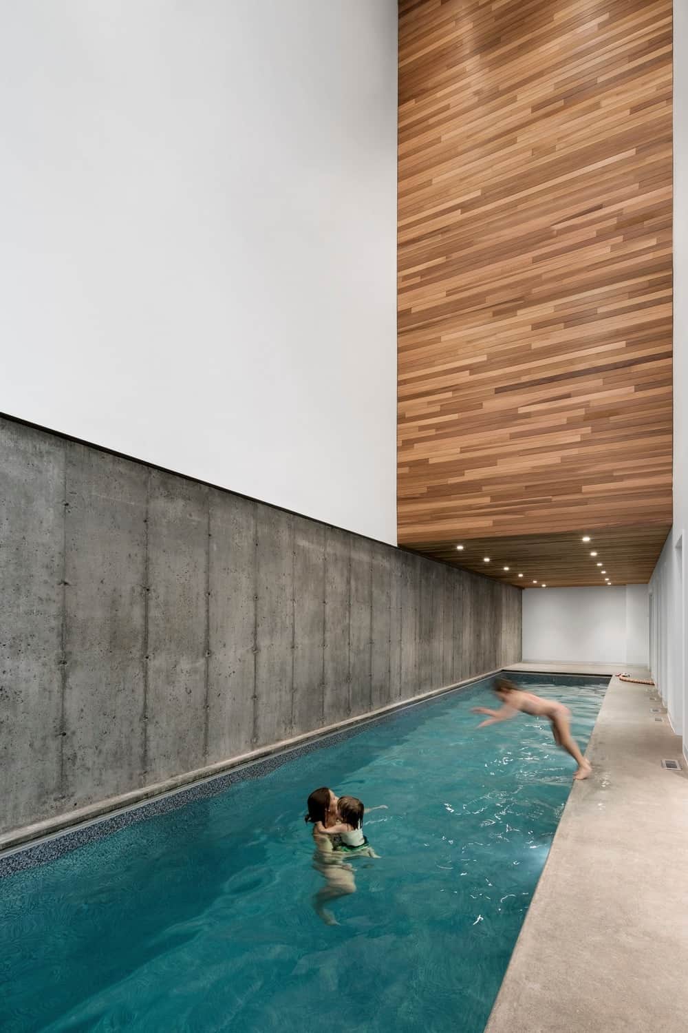 75 Cool Indoor Pool Ideas And Designs For 2018 Long Rectangle Pool With Recessed Ceiling Lights On A Hardwood