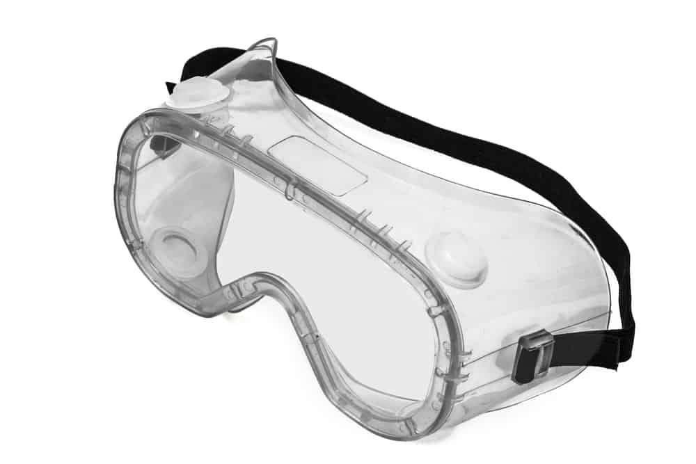 Safety goggles on white background.