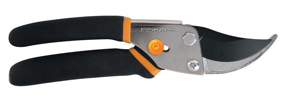Black bypass pruner with an orange lining.