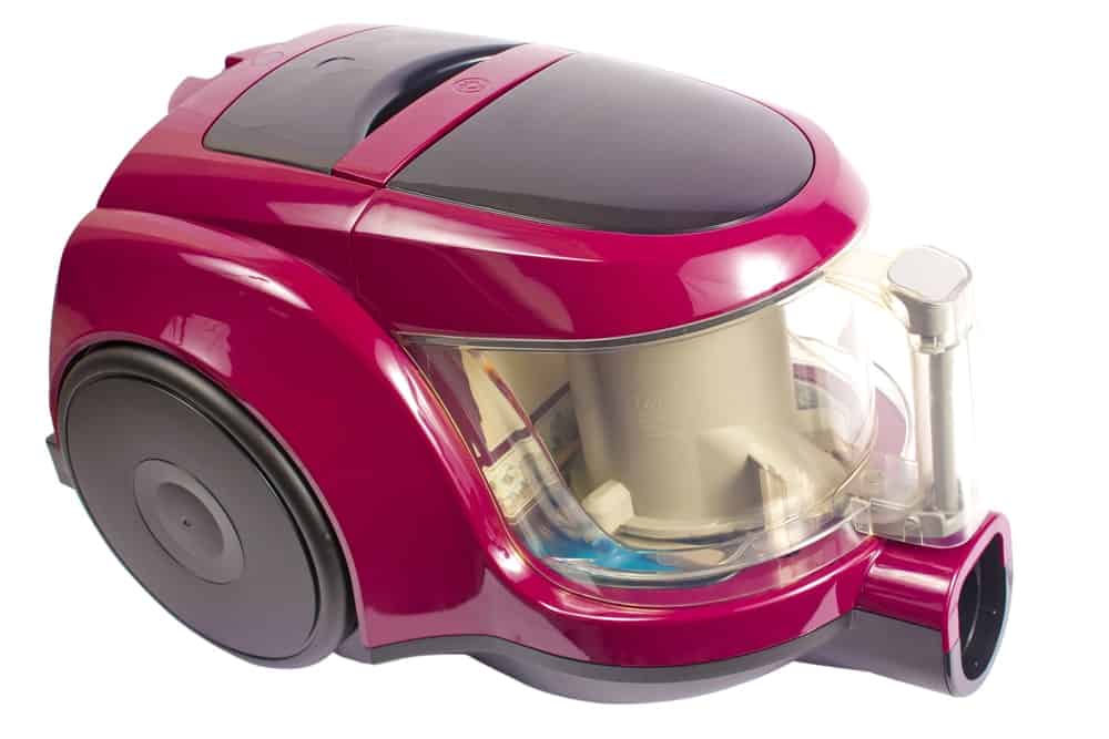 Modern vacuum cleaner on white background.