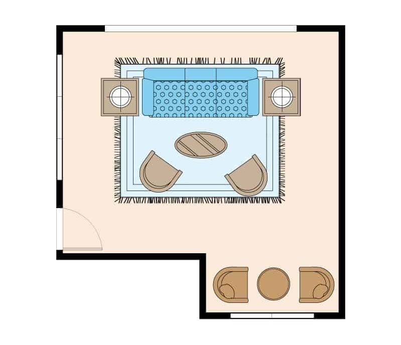 Living room layout with sofa with 2 end tables facing 2 armchairs on an area rug