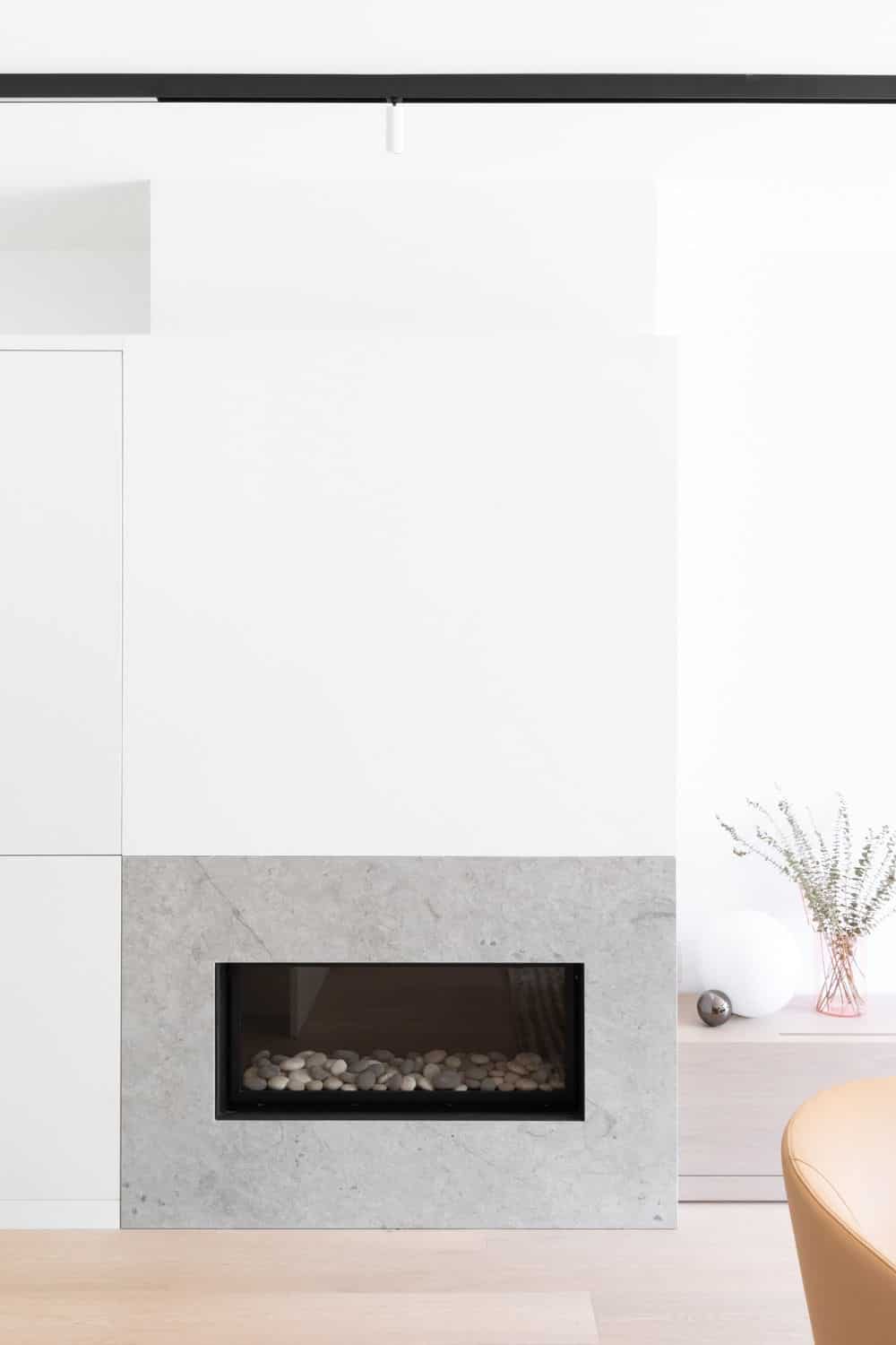 The fireplace is located near the living space. Photo credit: Ema Peter