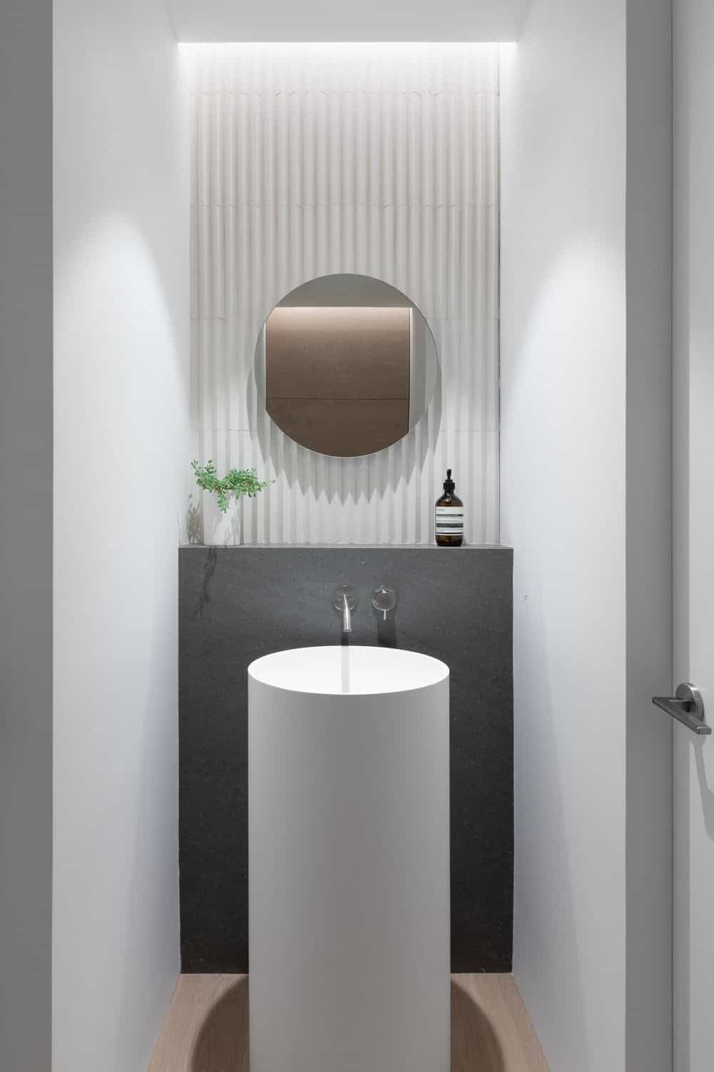 Tall sink area with stylish walls. Photo credit: Ema Peter
