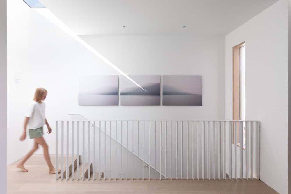 The home's staircase leads to the second floor. Photo credit: Ema Peter