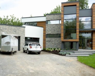 Outside view of the home featuring its garage and front entryway. Photo credit: Dominic Boudreau