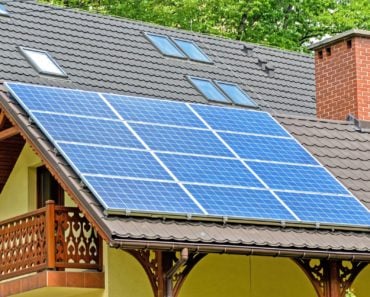 Photograph of solar panels on the roof of a suburban home