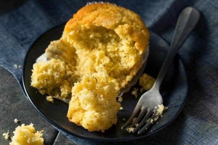 Half-eaten cornbread with a fork