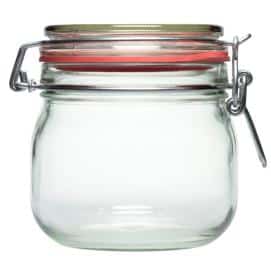 Glass container with a red lid