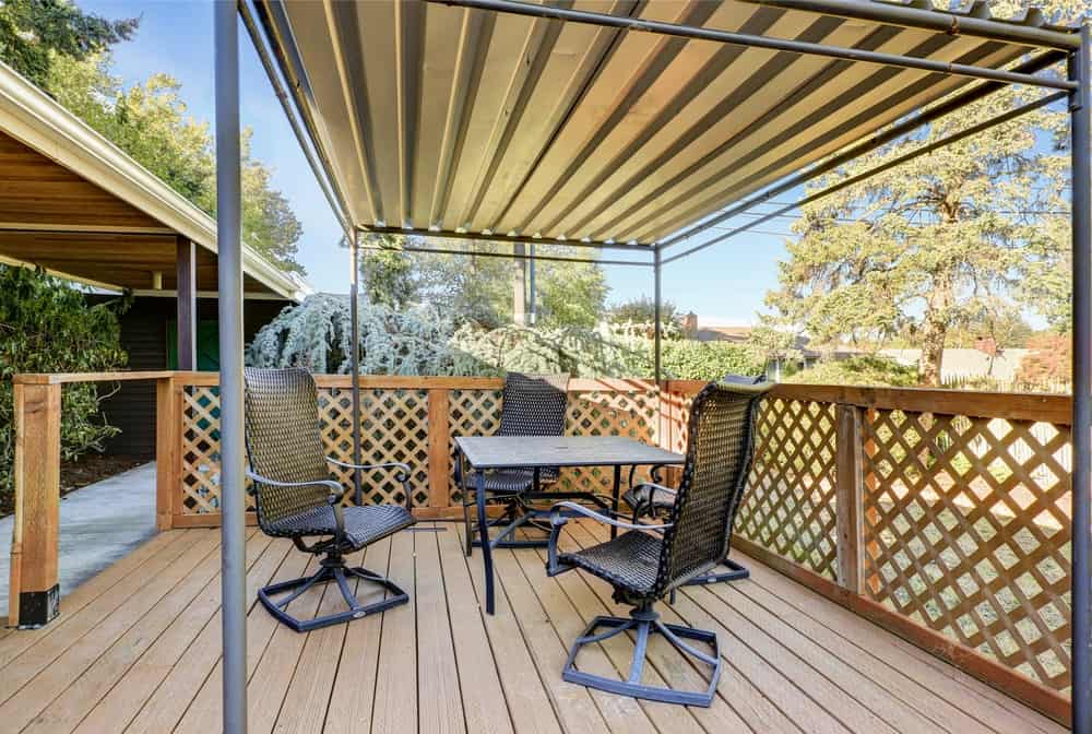 This deck features modern seats and table.