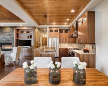 Kitchen with wood tray ceiling and recessed lighting