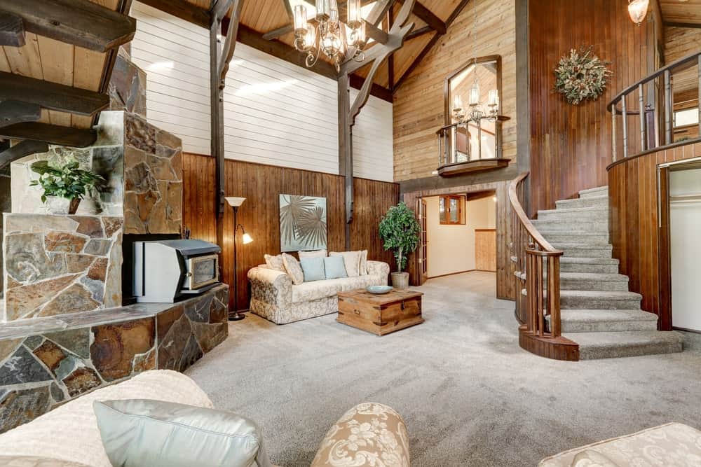 A stunning home with carpet floors extending to the home's staircase.