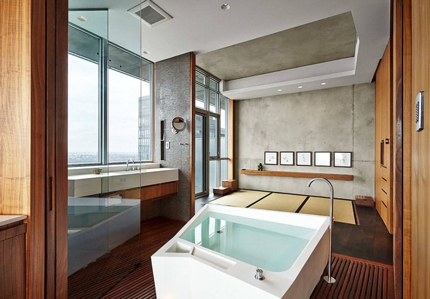 Large Asian-style primary bathroom featuring a freestanding soaking tub along with a walk-in shower room.