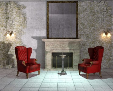 2 red wingback chairs flanking the fireplace