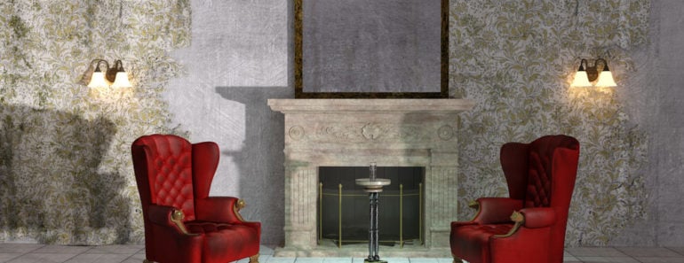 2 red wingback chairs flanking the fireplace