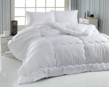 Bed with white duvet