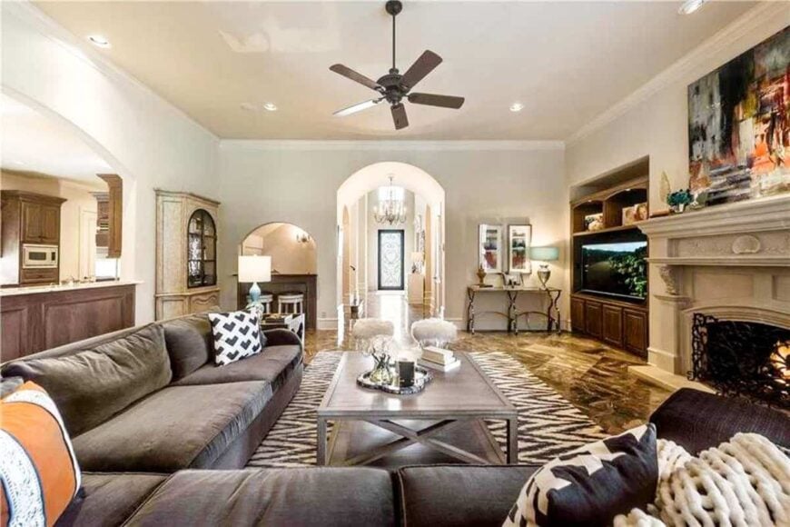 The opposite side view shows a smaller bar by the wine cellar and the foyer across.