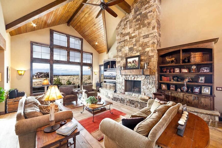 A massive window by the living room takes in an expansive view along with an ample amount of natural light.