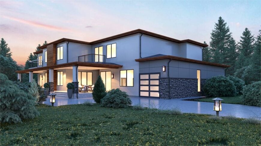 Angled rear exterior view with warm verandas and a covered patio lined with decorative columns.
