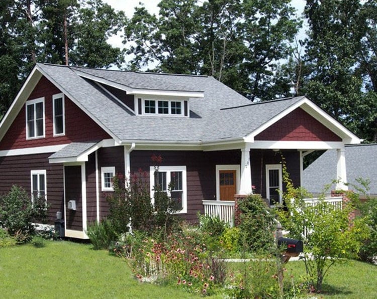 Another version of the bungalow home showcasing a deep red exterior siding.