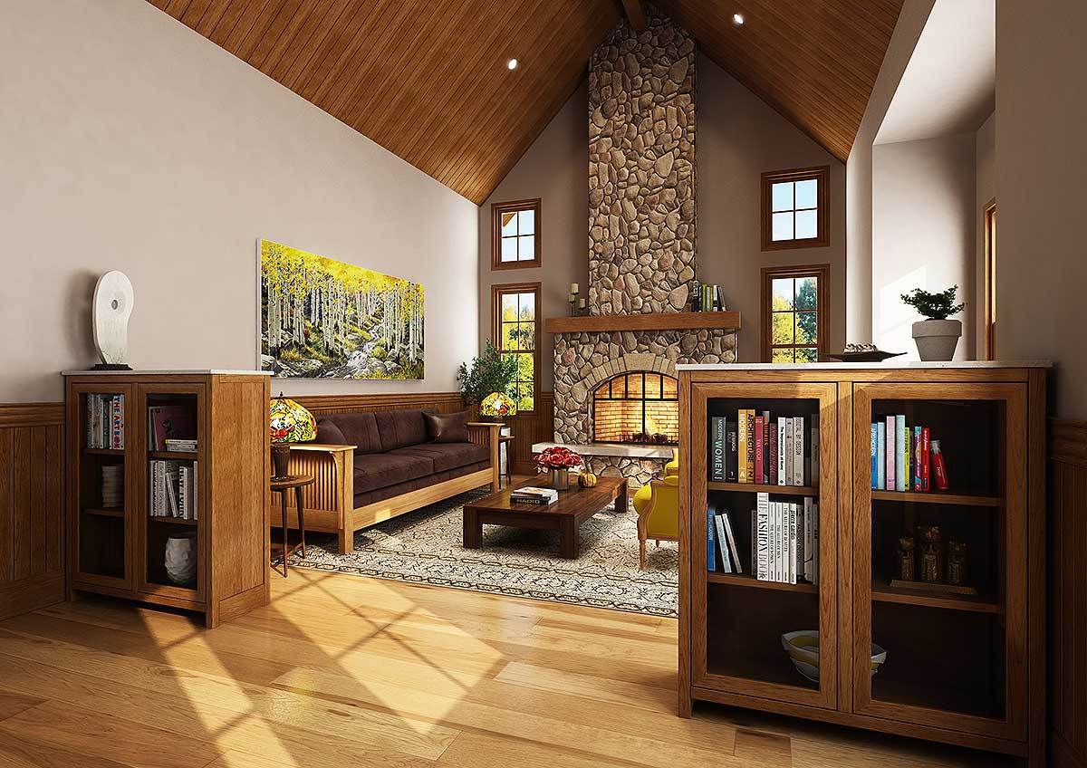 The living room offers a stone fireplace, glass-front cabinets, and comfy seats flanking a wooden coffee table.