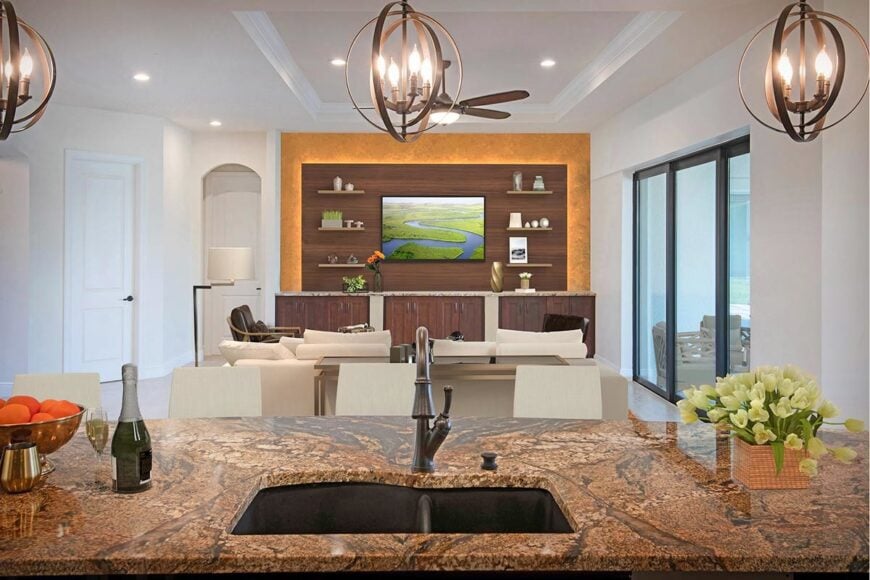 View of the living area from the center island that's fitted with an undermount sink.