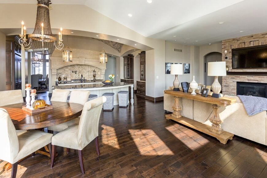 An open layout view showing the kitchen, breakfast area, and the hearth room.