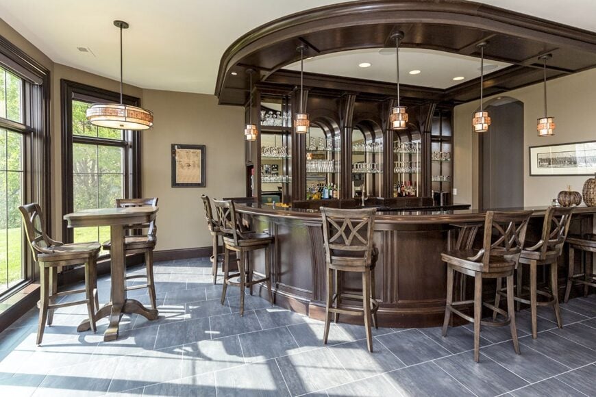A farther view shows the wooden seating on the side lit by a round pendant light.
