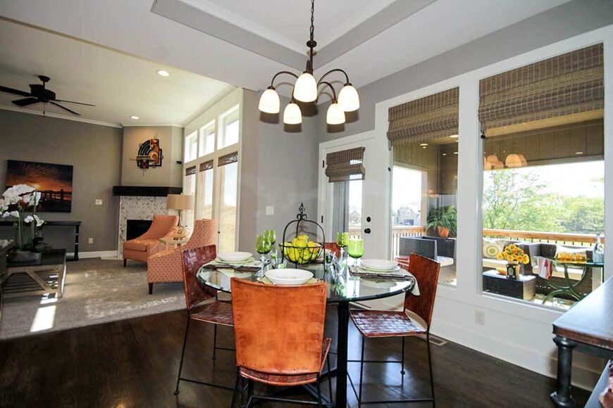 Across the dining area is the family room warmed by a corner fireplace.