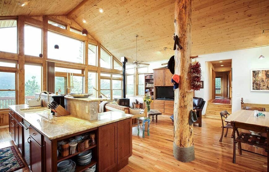 An open layout view showing the kitchen, dining area, and living room.An open layout view showing the kitchen, dining area, and living room.