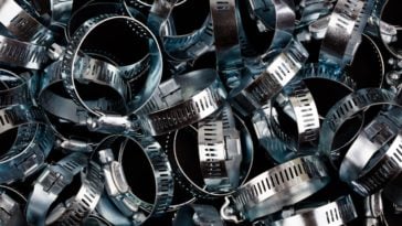 A close look at a bunch of stainless steel hose clamps.