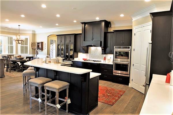 A farther view shows the dining room on the side placed near the bay window.