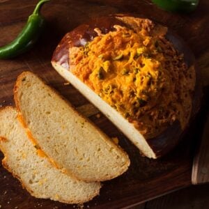 A look at a sliced loaf of cheddar jalapeno bread.