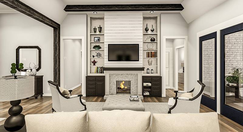 The living room has beige sectional, gray armchairs, tufted ottoman, and a fireplace with a TV on top.