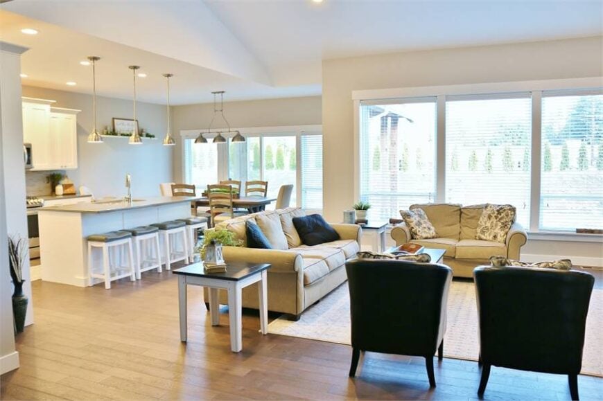 Massive windows and sliding doors on the right side bring in an ample amount of natural light.