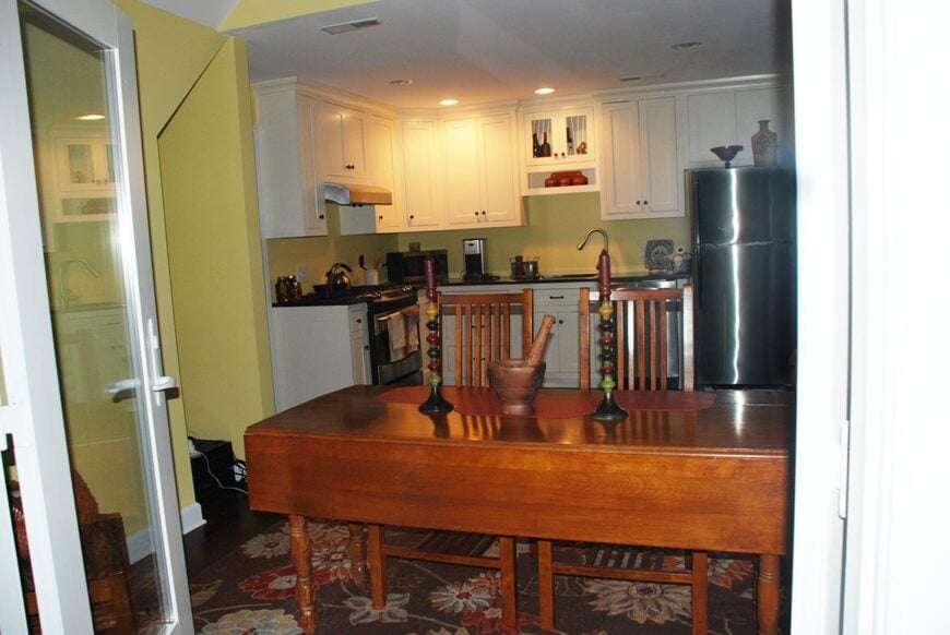View of the dining area and kitchen from the deck.